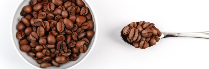 Cup and spoon filled with roasted coffee grains. coffee. layout. Flat lay.