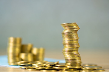 Stacks of coins and account book or credit card with copy space, finance and business finance, banking and savings concept.