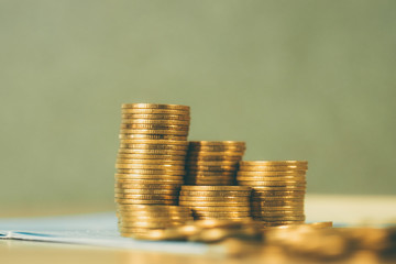 Stacks of coins and account book or credit card with copy space, finance and business finance, banking and savings concept.