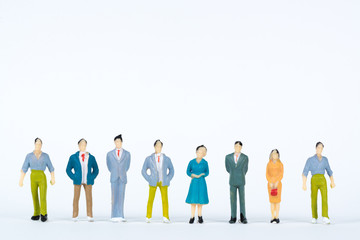Group of figure miniature businessman or small people investor and office worker secretary on white...