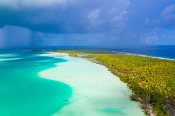 French Polynesia Tahiti aerial drone view of Fakarava atoll and famous Blue Lagoon and motu island...