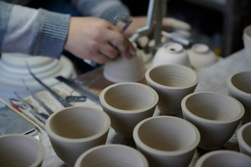 A close-up shot of making handmade ceramic products