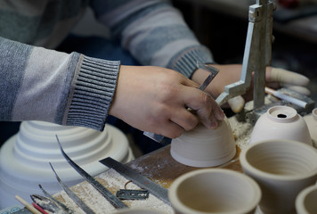 A close-up shot of making handmade ceramic products