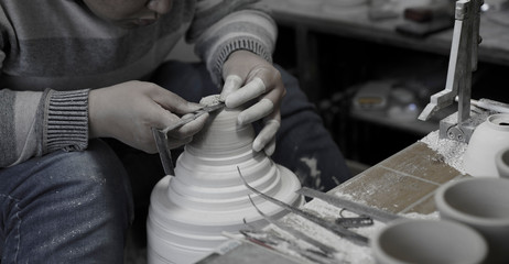 A close-up shot of making handmade ceramic products