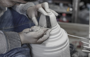 A close-up shot of making handmade ceramic products