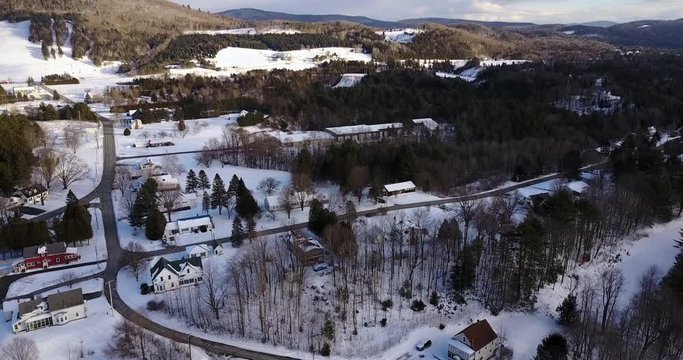 Aerial footage taken by drone of small town Lyndonville and Burke Vermont.