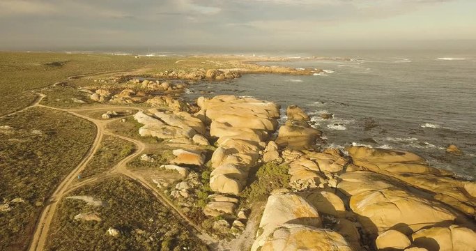 Flying from left to right over the rugged South African Atlantic coast, drone