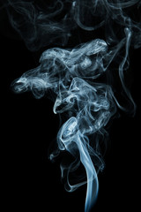 Blue smoke on black background