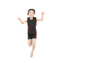 Asian girl standing and posing in gymnastic pose on white background. Concept for sport and healthy activity for modern kid..