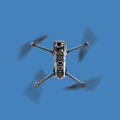 Drone in Flight over a blue sky background