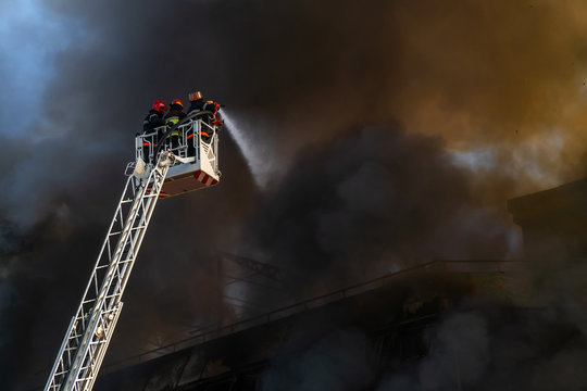 Firefighters extinguish a big fire