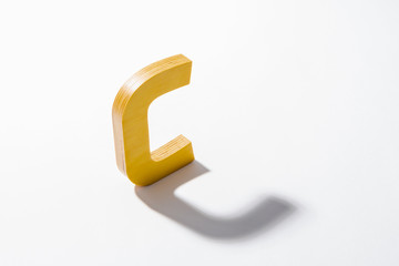 Wooden Alphabet C and Shadow Reflection.