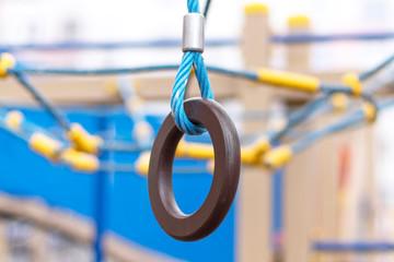 Fragment of the playground, ring on the rope