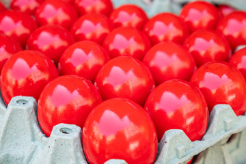 Easter eggs, red color background. Close up view