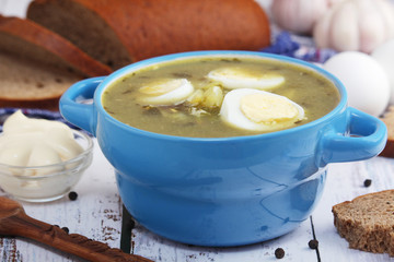 A bowl with homemade sorrel soup