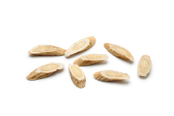 Sliced ​​of Astragalus (Huang Qi) isolated on white background, Chinese herbal medicine.