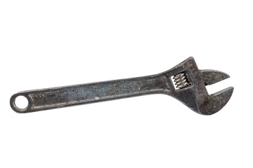 Old adjustable wrench close-up on a white background