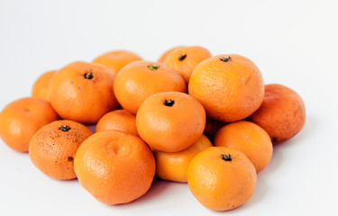 Fresh mandarin oranges (Citrus reticulata), vegetarian concept.