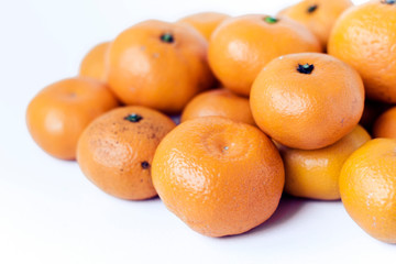 Fresh mandarin oranges (Citrus reticulata), vegetarian concept.