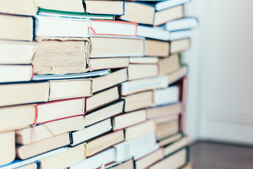 Stack of old book education concept background, many books piles with copy space for text.