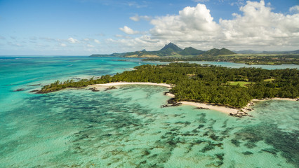 An aerial picture of the Île aux Cerfs in front of Mauritius. Île aux Cerfs is a paradisal island. - obrazy, fototapety, plakaty