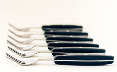 Close up six forks isolated on white background.