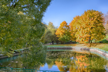 Fototapeta premium autumn landscape with lake and trees