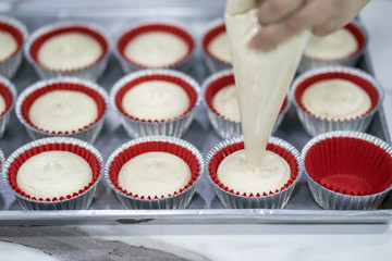 Hand of woman making banana cake homemade