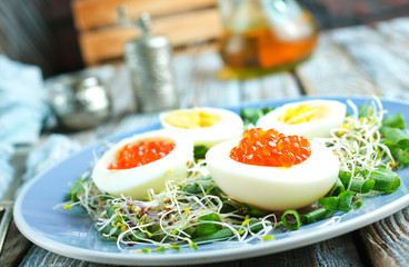 eggs with red salmon caviar