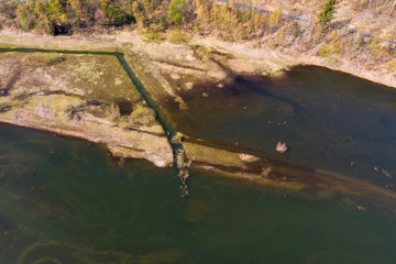 Aerial photograph of the inlet of a dam with the shallow water zone