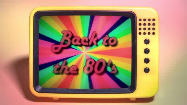 A transmission viewed on a fancy TV screen: the text Back to the 80s, appearing on a rainbow pinwheel rays colorful animation. 1980s retro vintage intro.