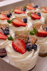 dessert in a glass decorated with berries