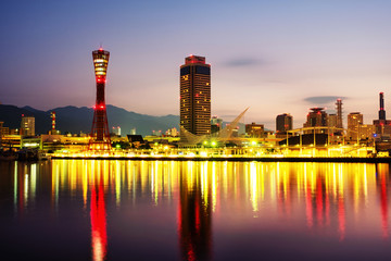 View of sunrise in Kobe, Japan. Cloudless sky with harbor