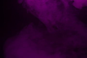 Colorful smoke close-up on a black background