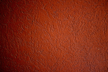 dark red wall on a sunny day, texture