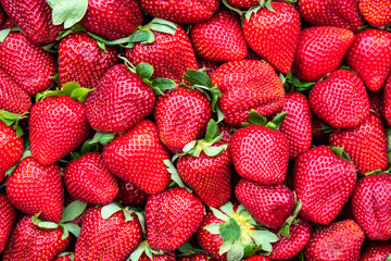 red strawberries pattern in market, fresh strawberries texture, fruit