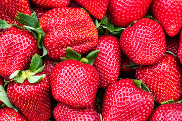 red strawberries pattern in market, fresh strawberries texture, fruit
