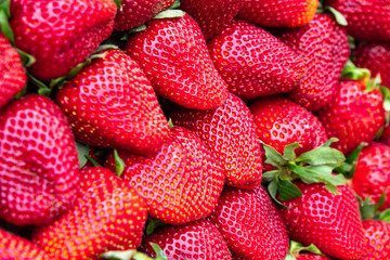 red strawberries pattern in market, fresh strawberries texture, fruit