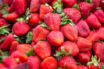 red strawberries pattern in market, fresh strawberries texture, fruit