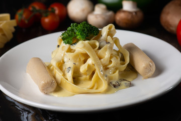 fettuccine carbonara  with sausage