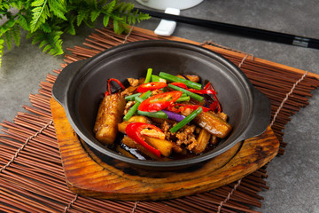 chinese food with eggplant ,long beans and chillies cooked in claypot