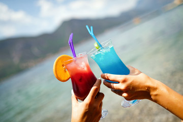 Two fresh tropical juices on tropical beach