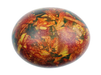 Fototapeta premium Easter chicken egg boiled in red onion peels and cabbage slices isolated macro