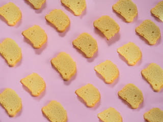 Slice cake pattern on pink background