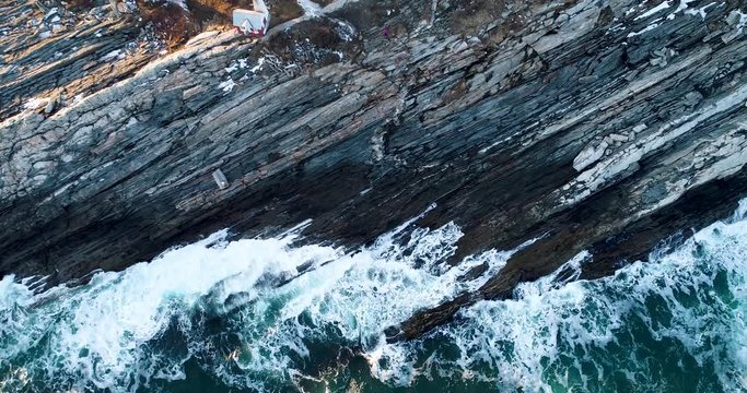 Extreme aerial view by the rocks in Curtis island lighthouse Camden Maine USA