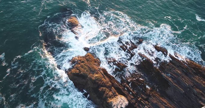 Aerial view of the edge of the rocky shore of Curtis island lighthouse Camden Maine USA