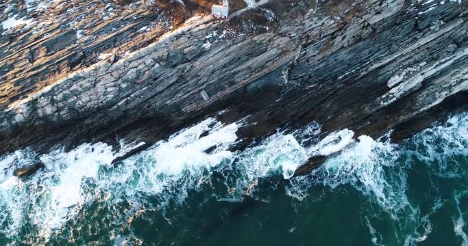 Extreme aerial view by the rocks in Curtis island lighthouse Camden Maine USA