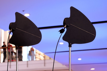 Antenna signal amplification Receive and send wireless microphone signals. - Powered by Adobe