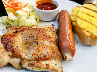 Grilled Pork Steak and German Sausage and Salad