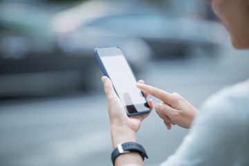 Woman use smartphone at city